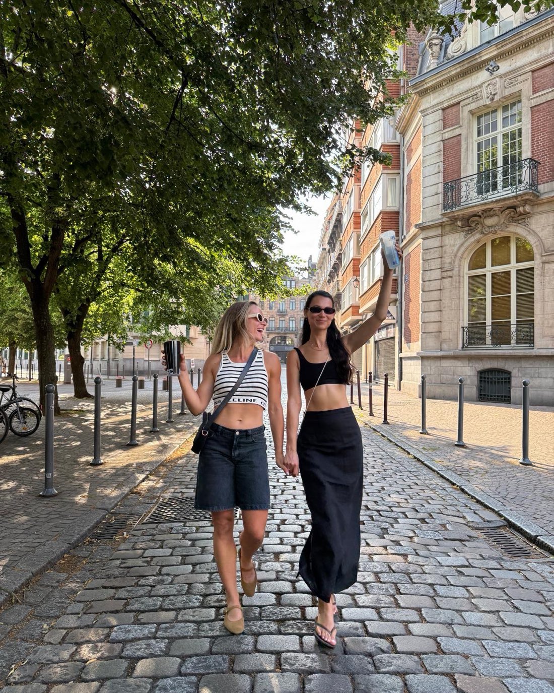 Céline and Isil, founders of Aura Social Club, in the street in Lille